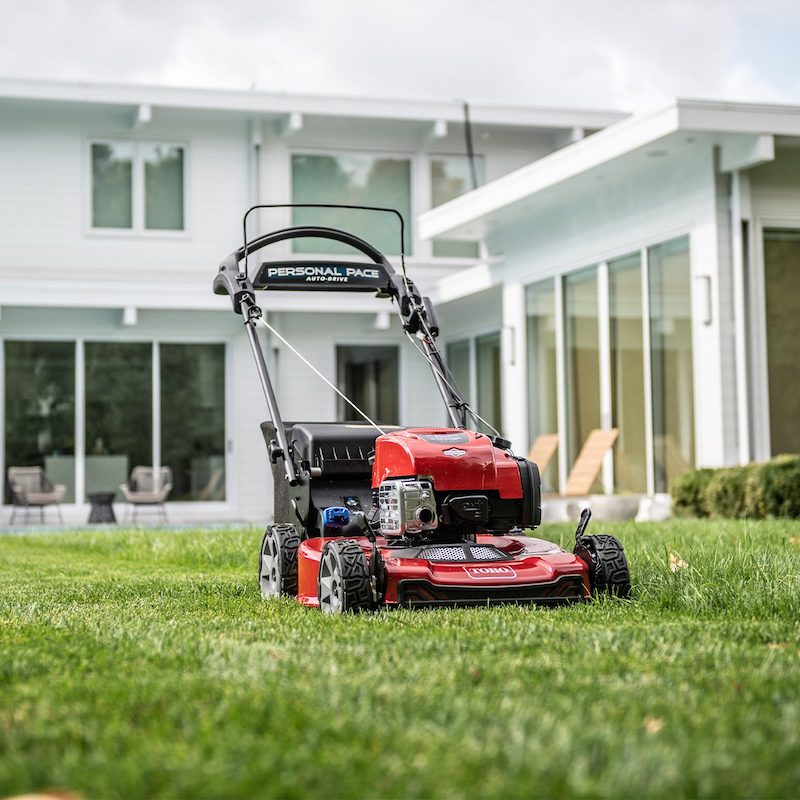 lawn mower blowing white smoke